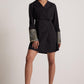 Black dress blazer for women with embroidered cuffs by Stylera modeled in full length