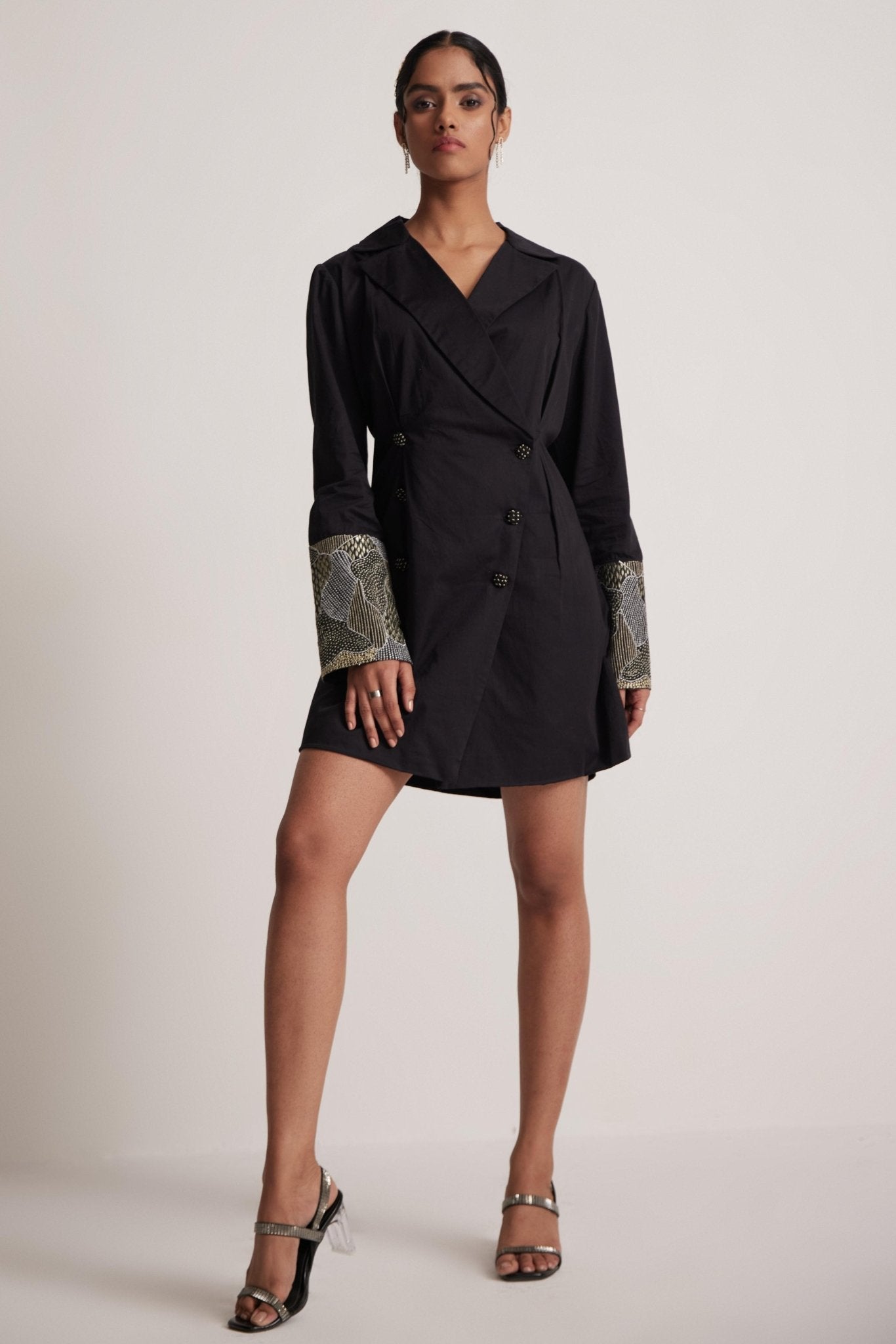 Black dress blazer for women with embroidered cuffs by Stylera modeled in full length
