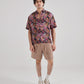 Men's black floral drop shoulder shirt by Stylera featuring vibrant tropical prints for a stylish look.