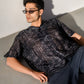 Black geometric silk shirt for men with short sleeves and a relaxed fit, perfect for casual stylish wear