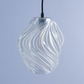 Elegant black hanging lamp for living room with a unique twisted glass design