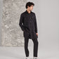 Stylish black kurta set for men with a button-up shirt and matching pants, perfect for casual outings
