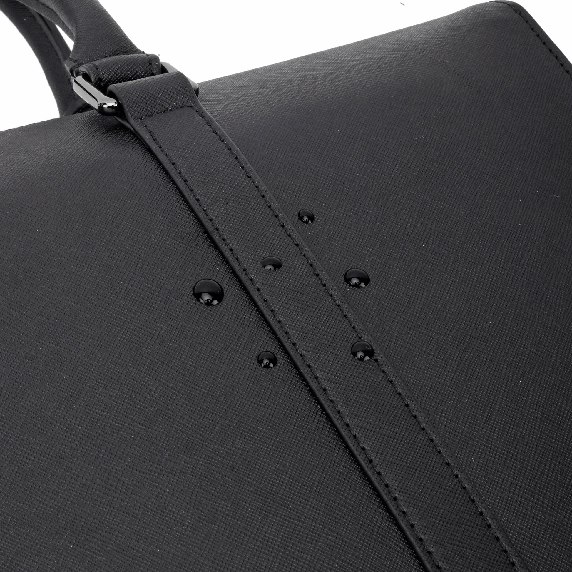 Stylera black leather briefcase laptop bag close up showing textured water resistant surface with strap and water droplets