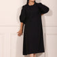Elegant black midi dress for women with puff sleeves, perfect for casual or formal occasions