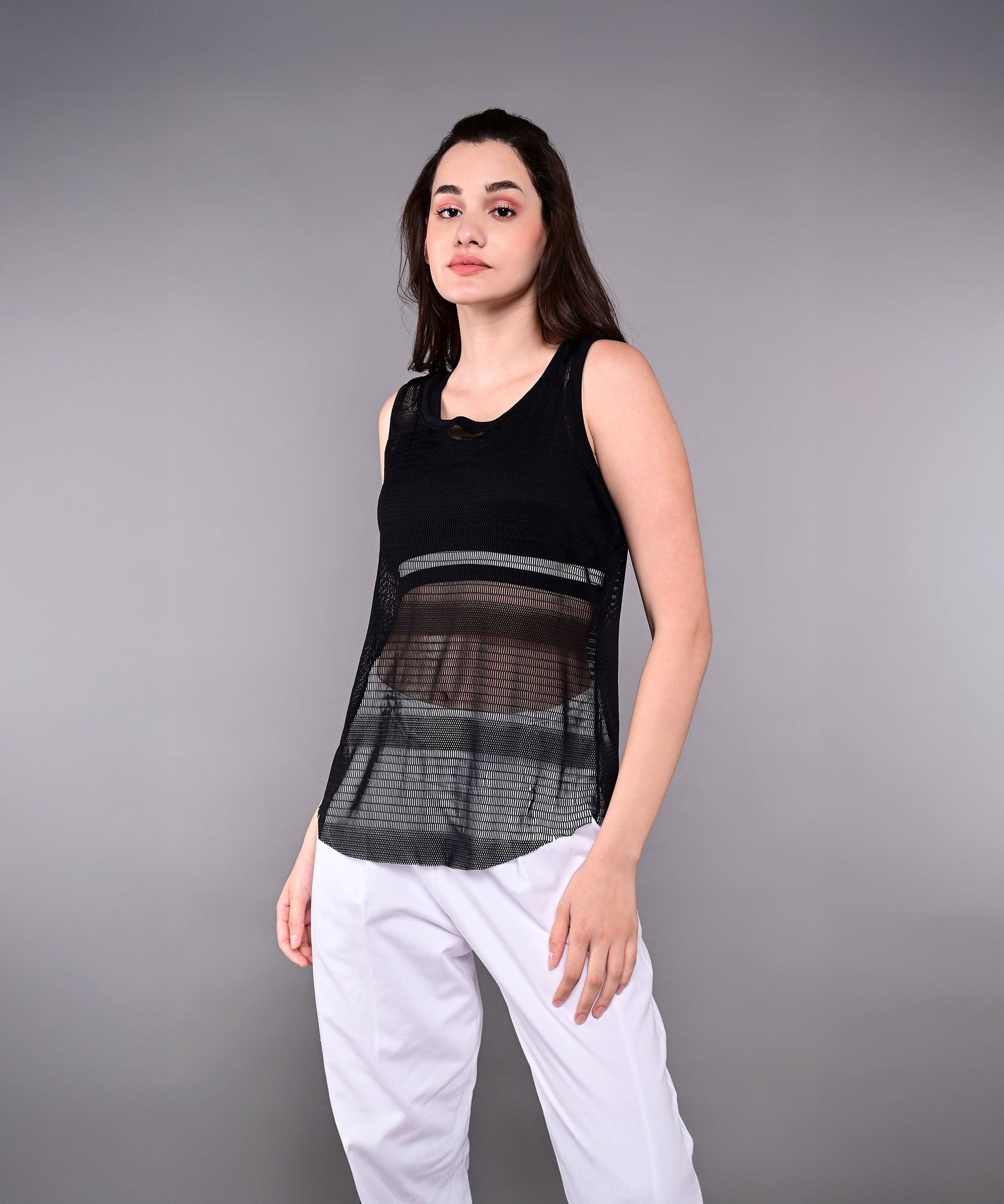 Stylish black netted tank top for women, perfect for casual wear and layering options