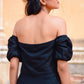 Elegant black off shoulder short dress with puffed sleeves for a stylish look