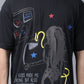 Stylstpls black oversized crew neck t-shirt featuring a graphic design of a strong woman