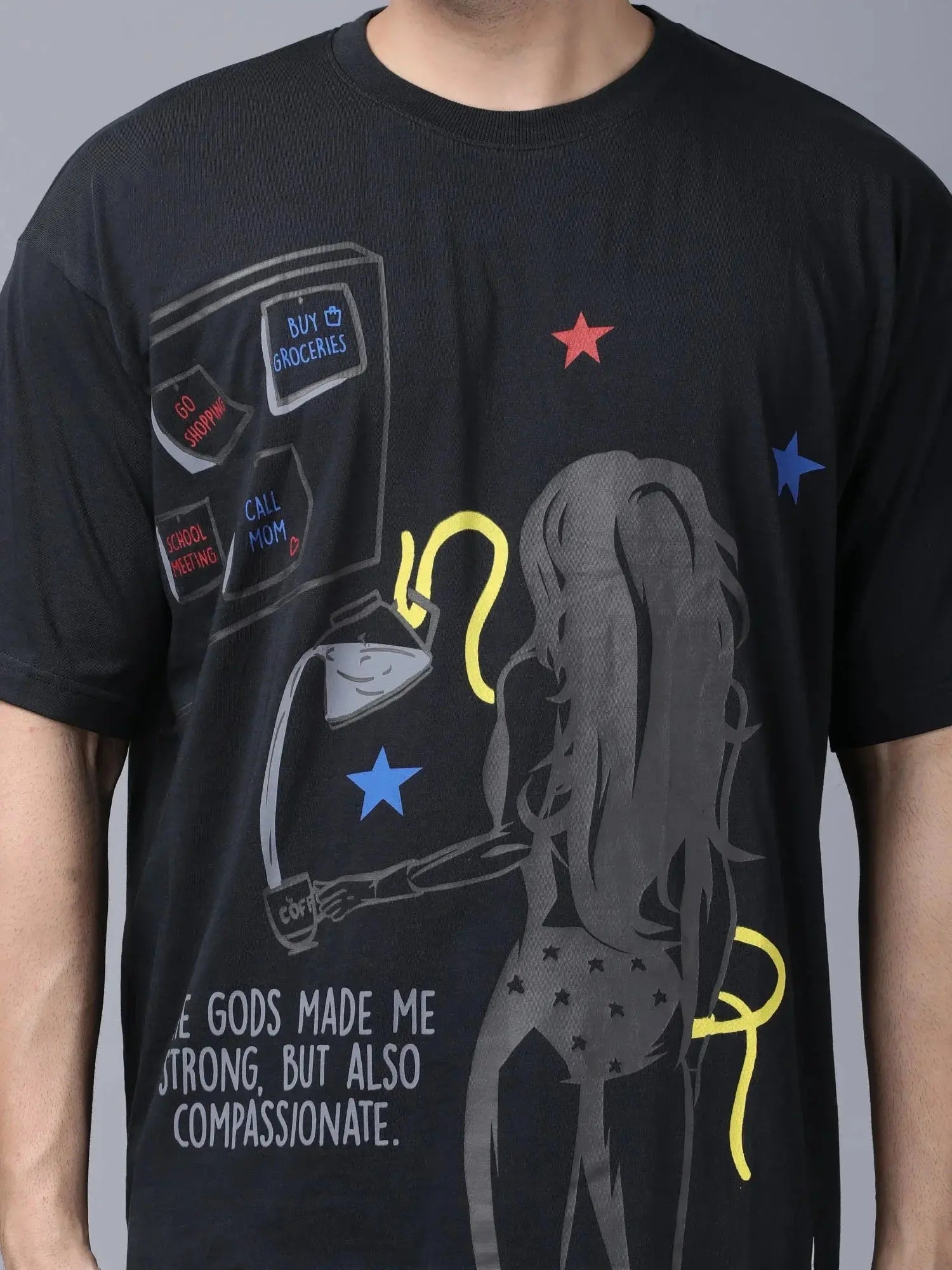 Stylstpls black oversized crew neck t-shirt featuring a graphic design of a strong woman