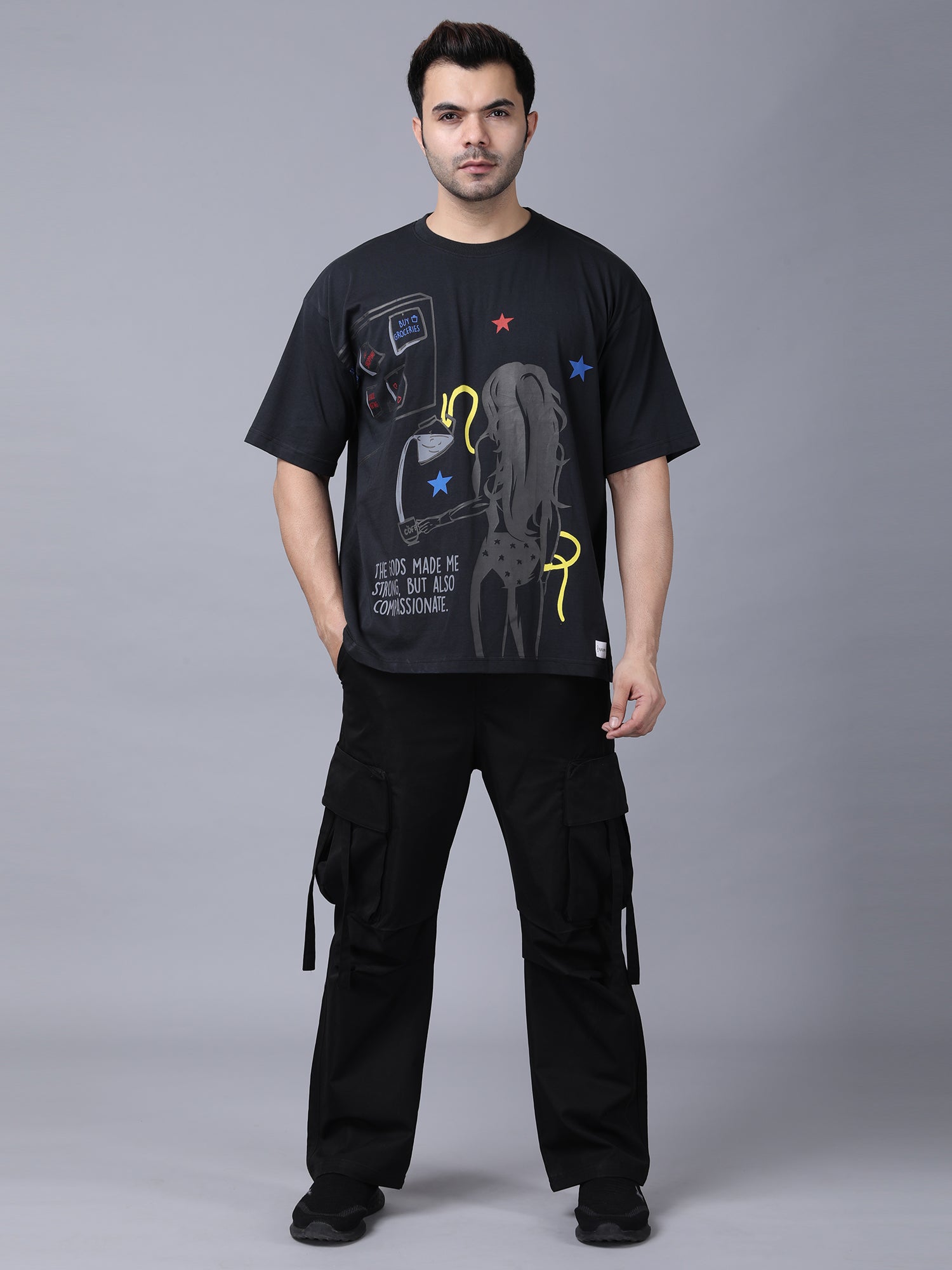 Stylstpls black oversized crew neck t-shirt featuring a graphic design and relaxed fit