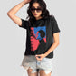 Stylera black print t-shirt for women featuring colorful graphic worn with denim shorts