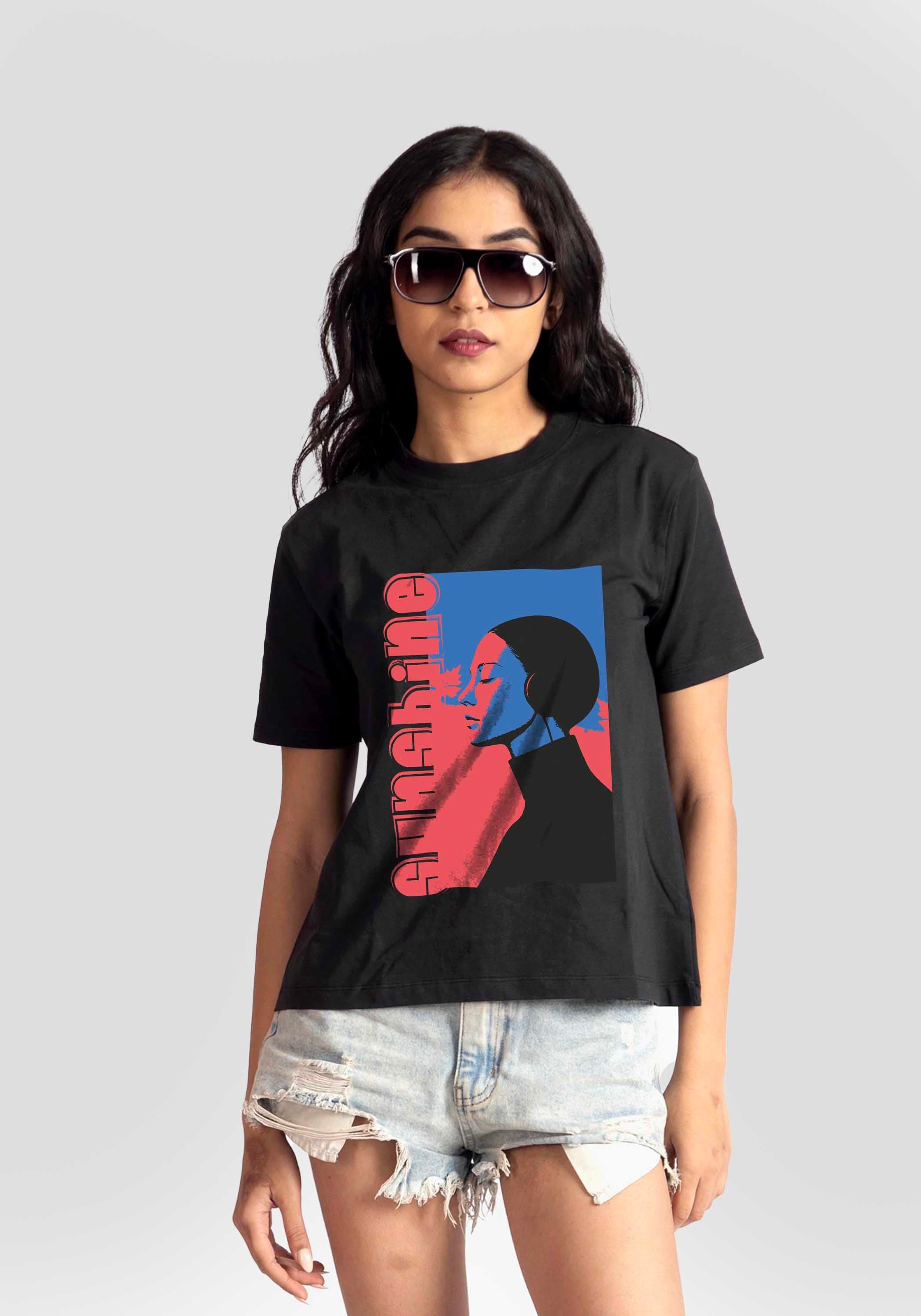Stylera black print t-shirt for women with colorful graphic worn with denim shorts