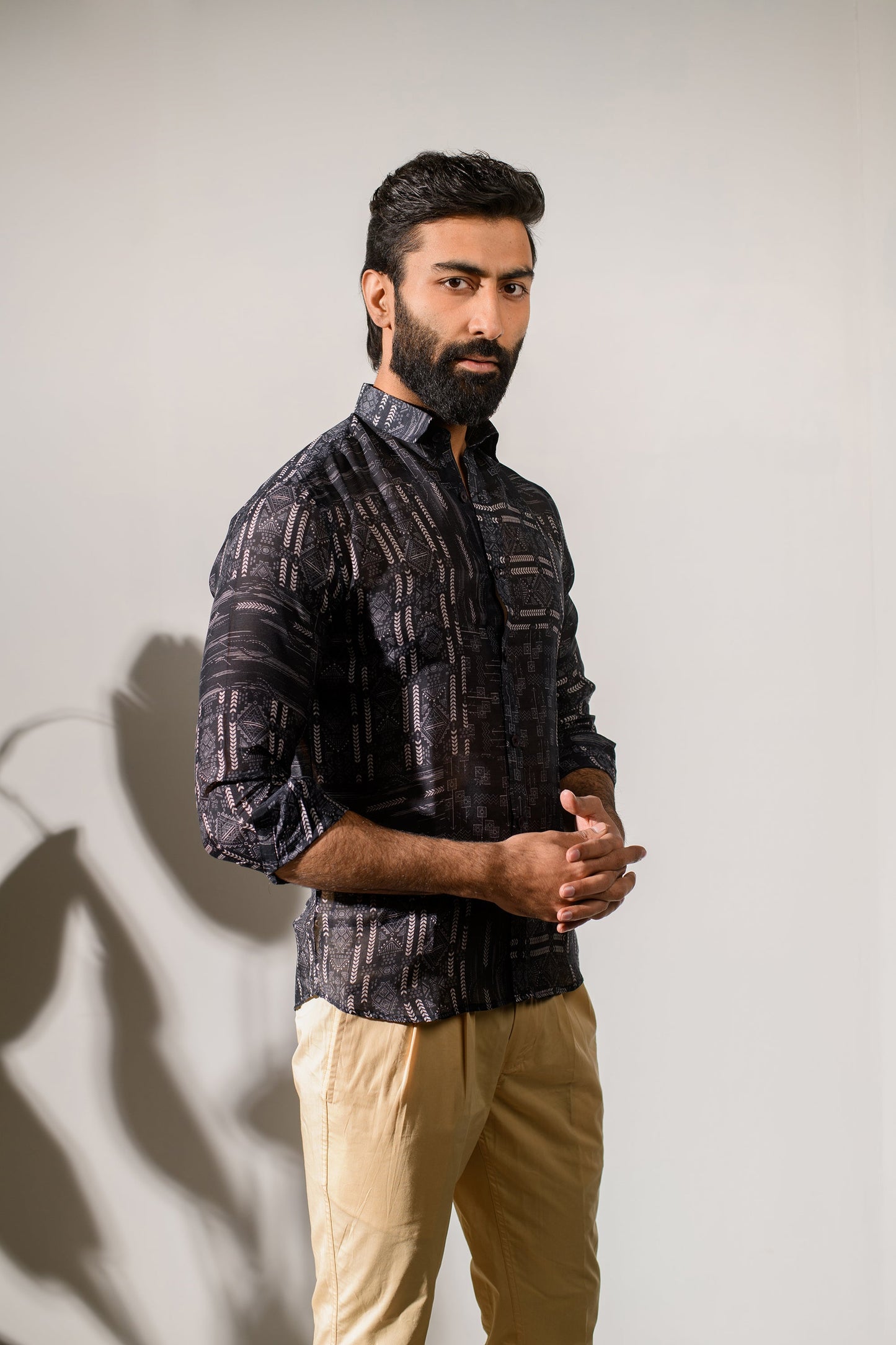 Stylish black silk oxford shirt for men by Stylera with a patterned design