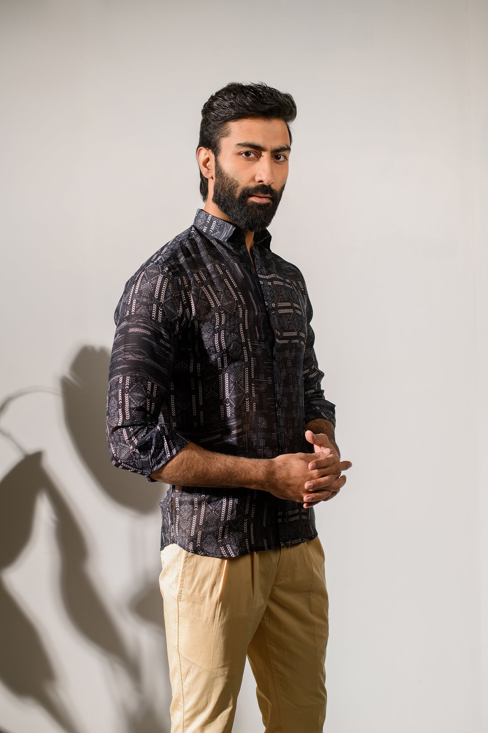 Stylish black silk oxford shirt for men by Stylera with a patterned design