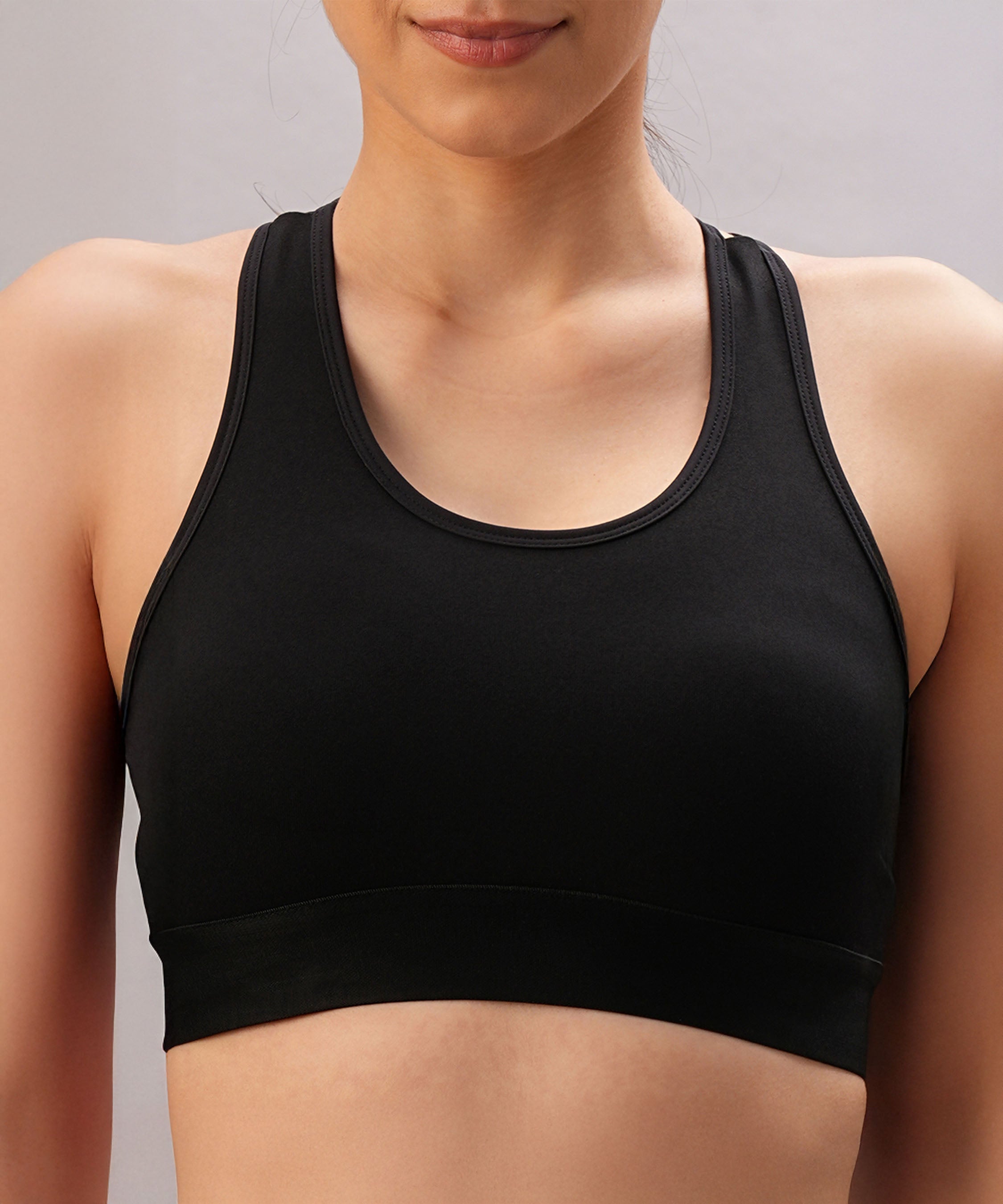 Stylera black sports bra for women with a comfortable and supportive design for workouts