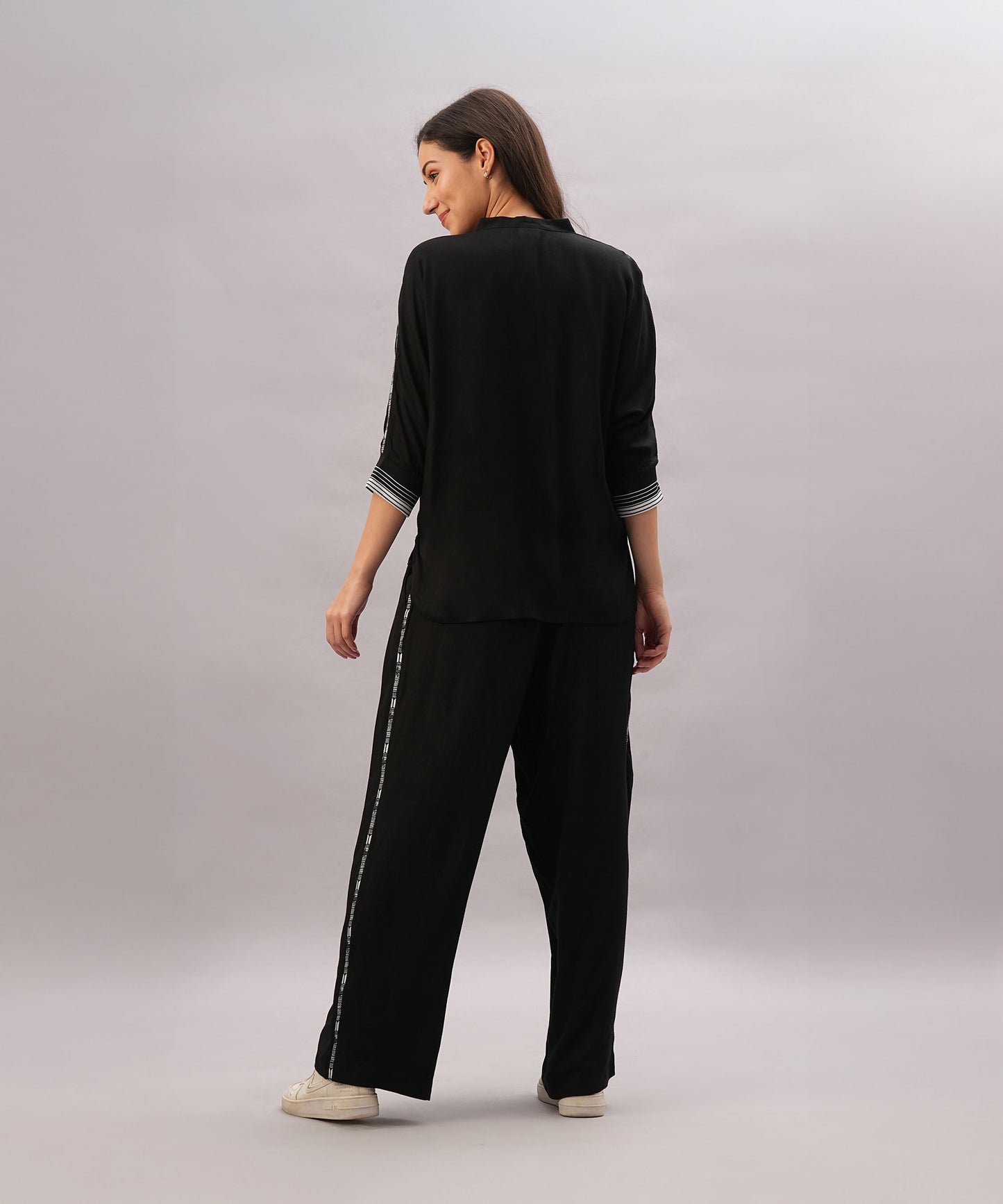 Black two piece lounge set women featuring loose fit top and wide-leg pants for comfort