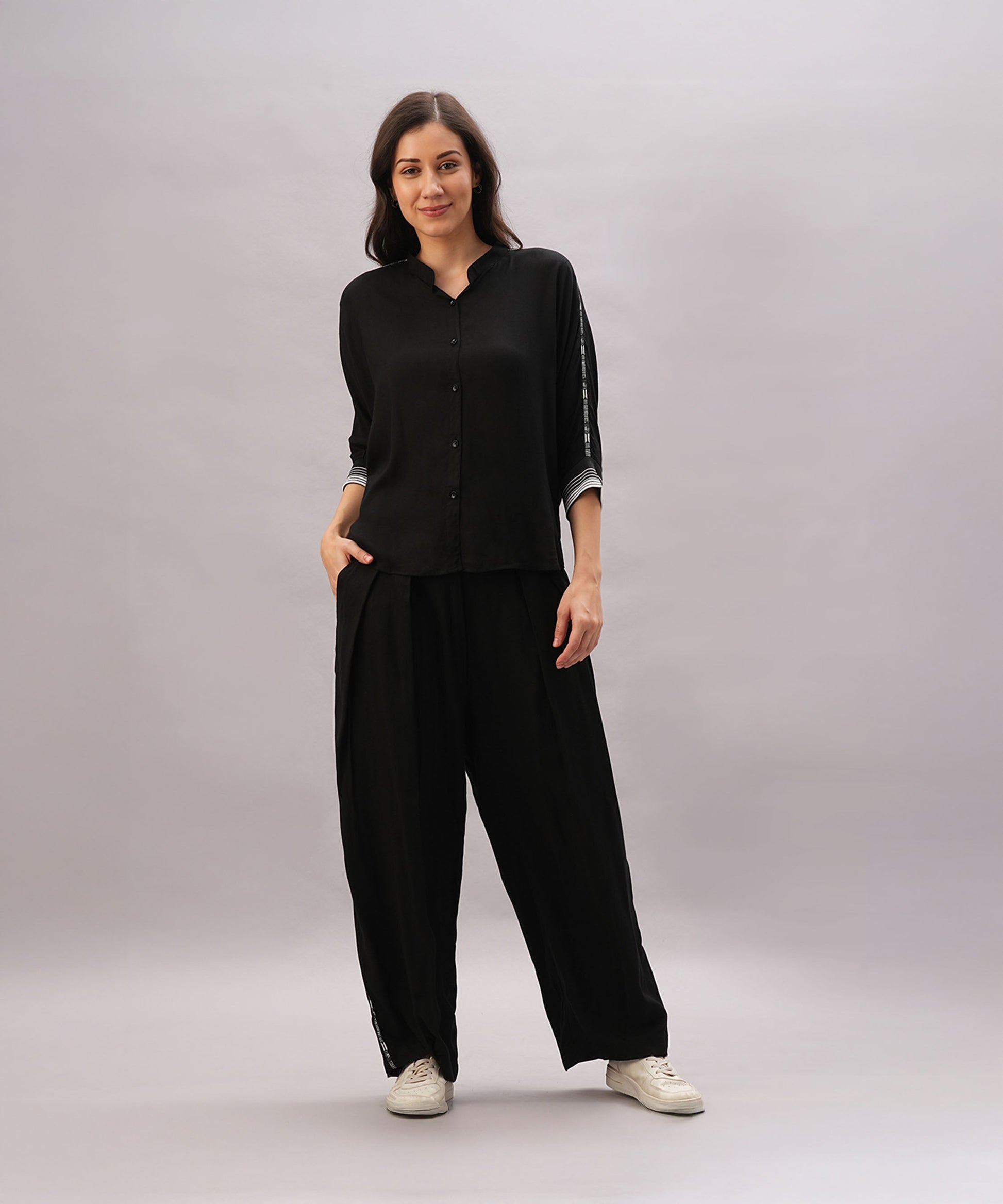 Stylish black two piece lounge set women with button-up top and relaxed fit pants