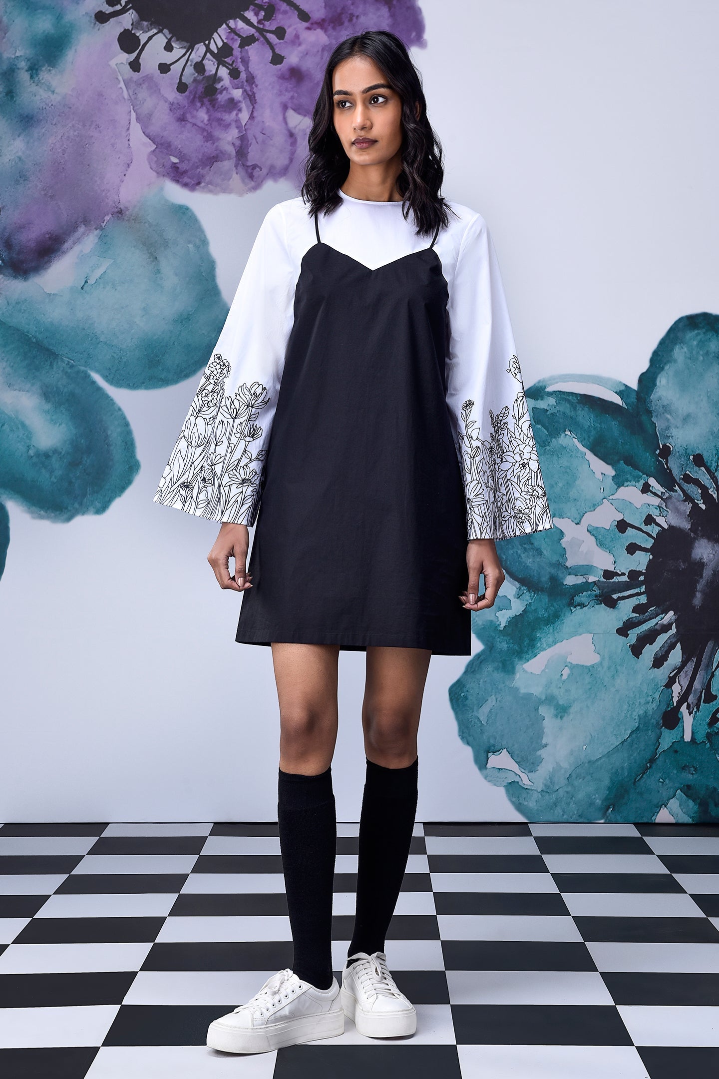 Stylera black white layered dress slip overlay over embroidered white sleeves