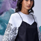 Stylera model wearing black white layered top with floral print wide sleeves and round neck