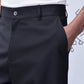 Stylera black wool straight fit trousers waist close up with side pocket and buttoned waistband