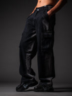 Front view of men wearing black rugged denim jeans with side acid-wash detail.