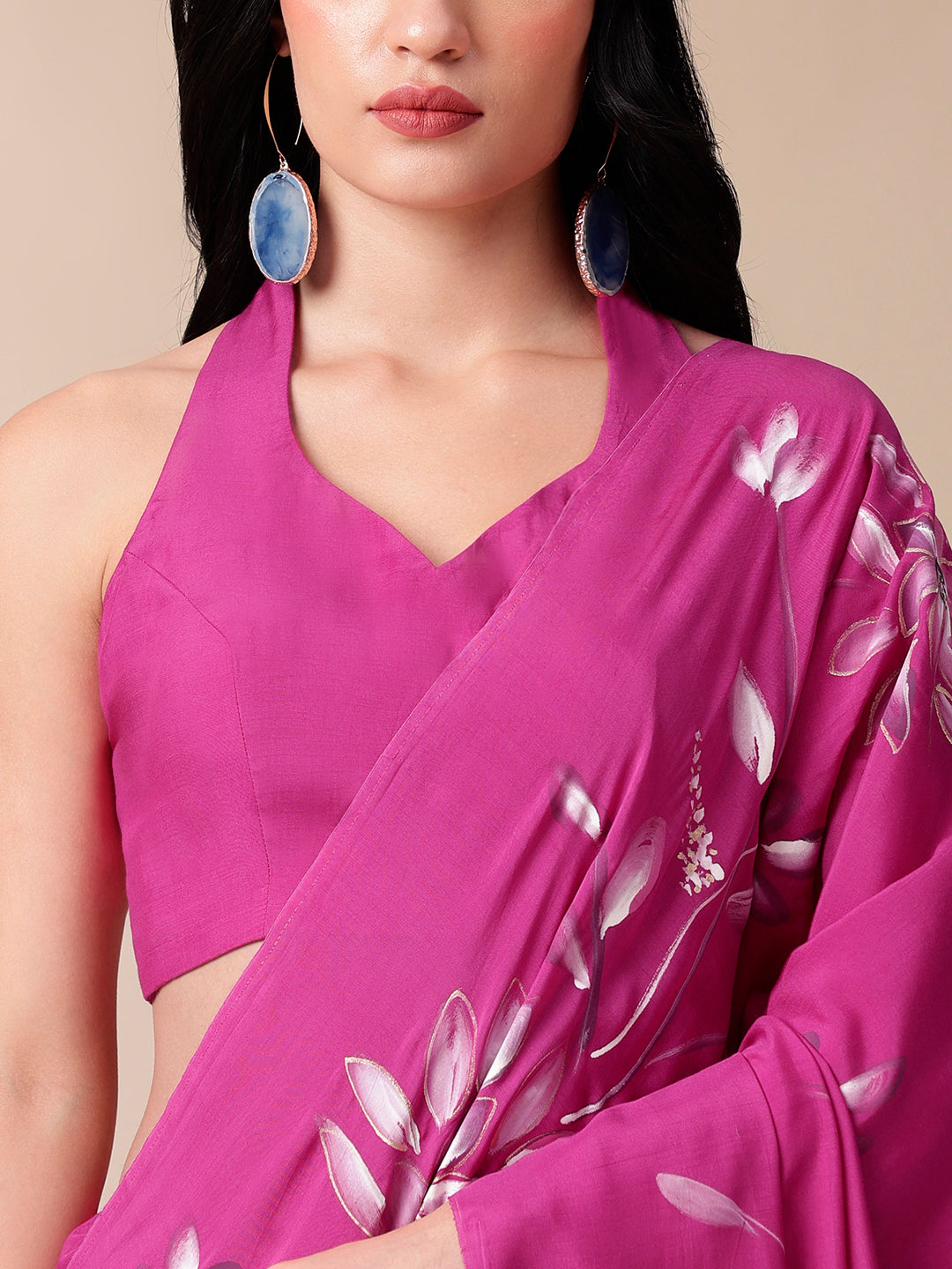 Elegant Stylera blissful brush pink silk saree with floral prints and stylish halter neck design