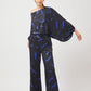Stylera blue black print two piece set featuring off-shoulder top with wide sleeves and matching pants