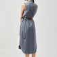 Stylera blue button down midi dress sleeveless with side tie belt shown from back