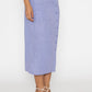 Stylera blue button front midi skirt worn with strappy sandals on model