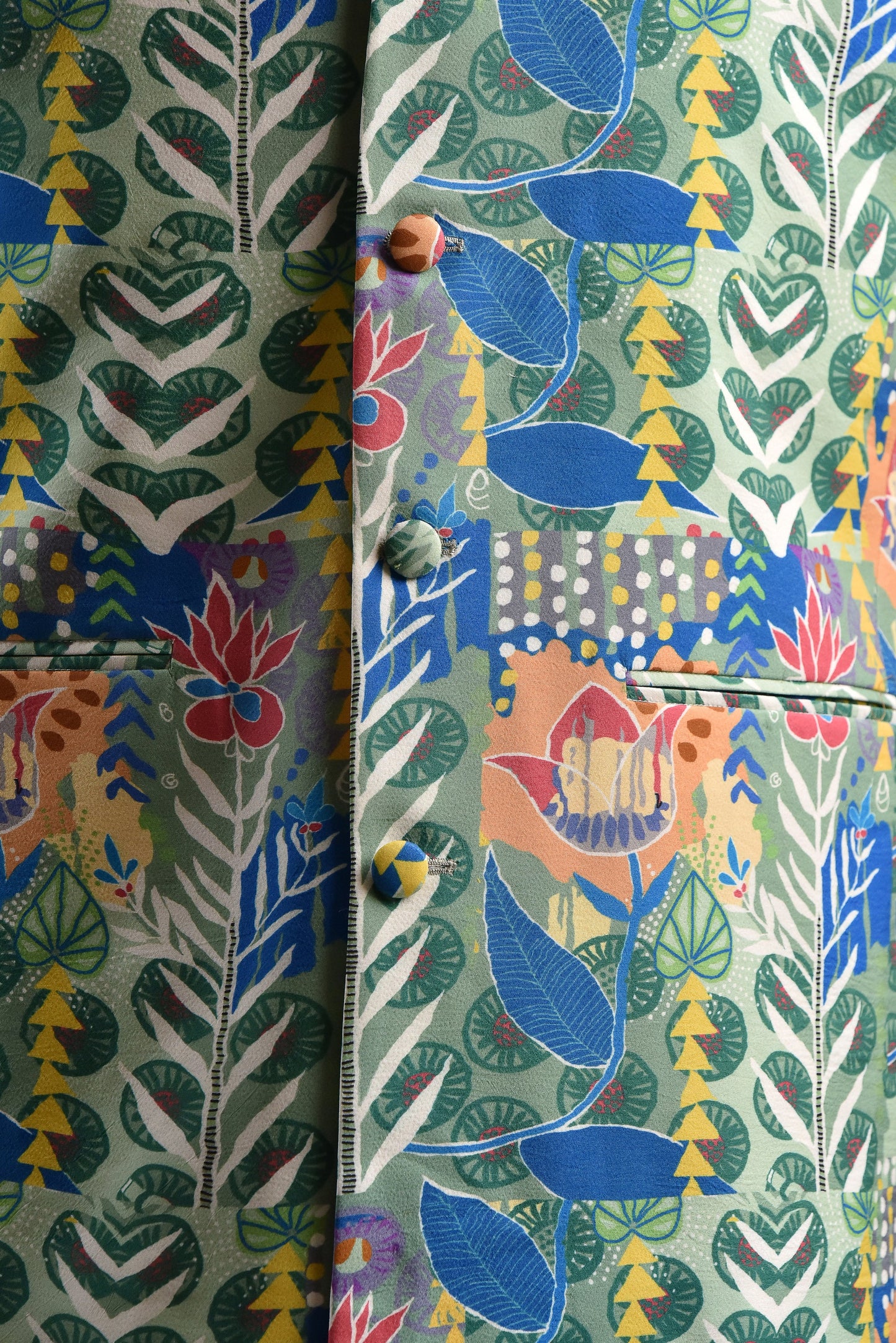 Blue floral bandi for men featuring vibrant botanical patterns and colorful buttons