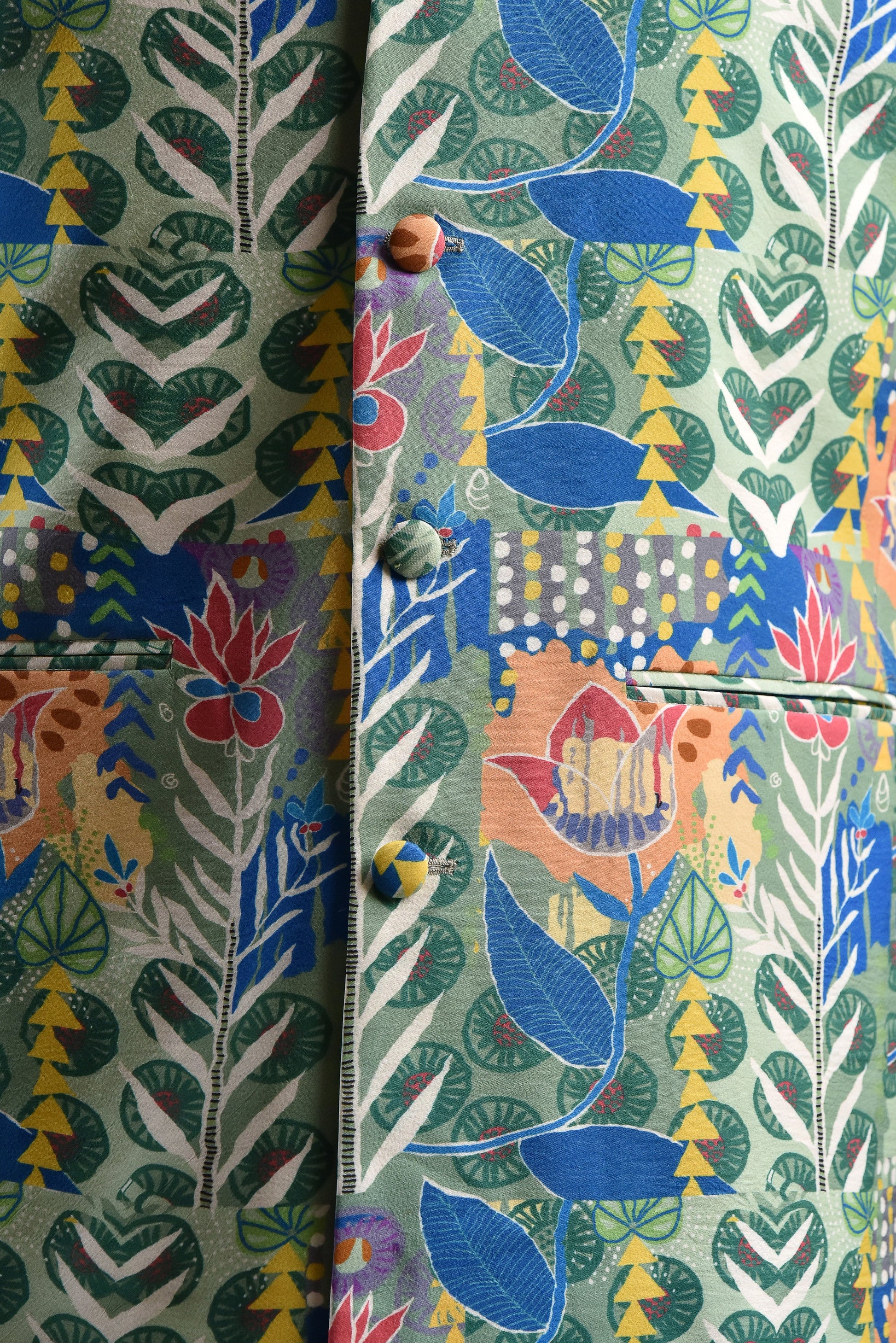 Blue floral bandi for men featuring vibrant botanical patterns and colorful buttons