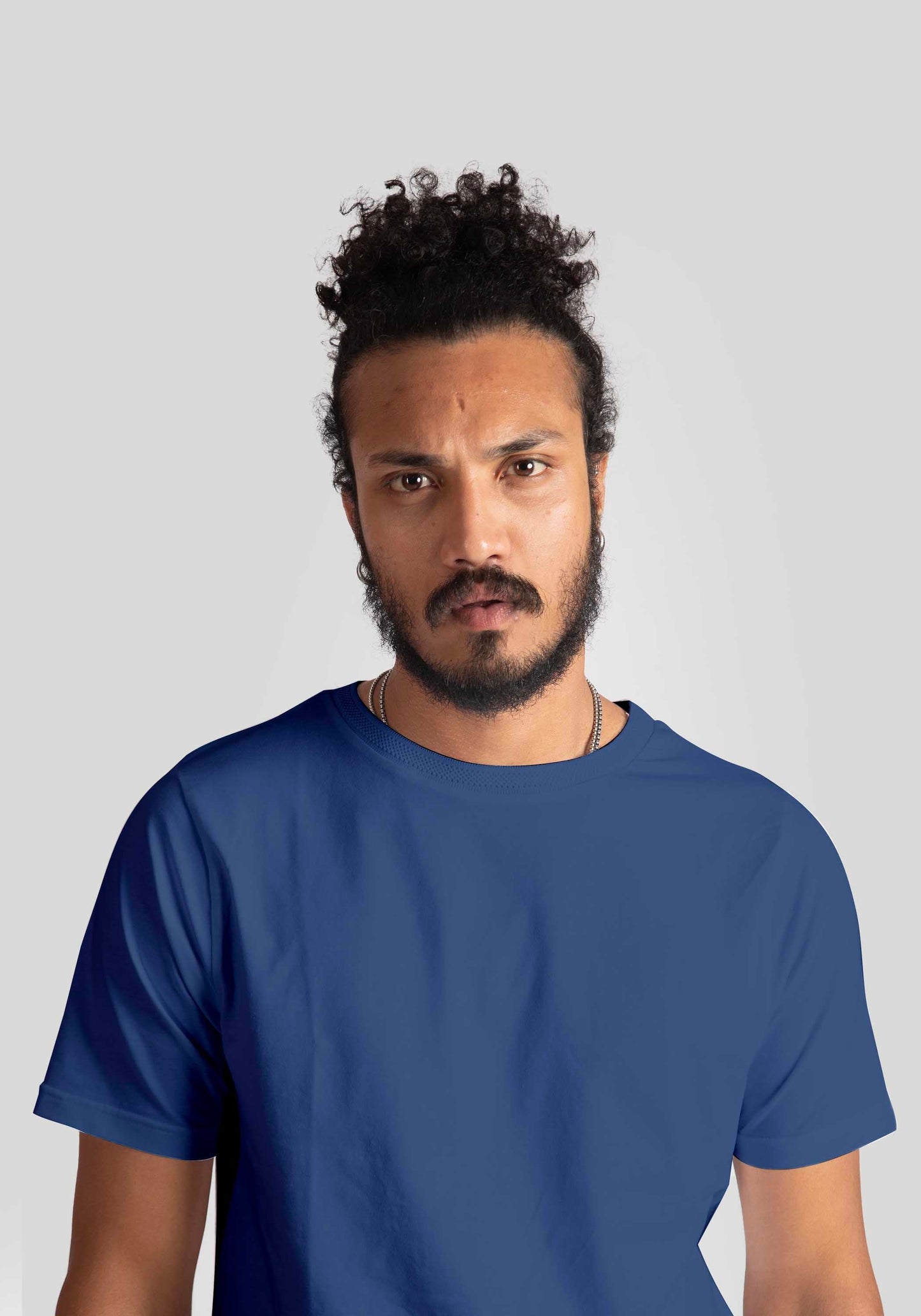 Stylera blue jacquard regular fit t-shirt worn by man with curly hair and beard