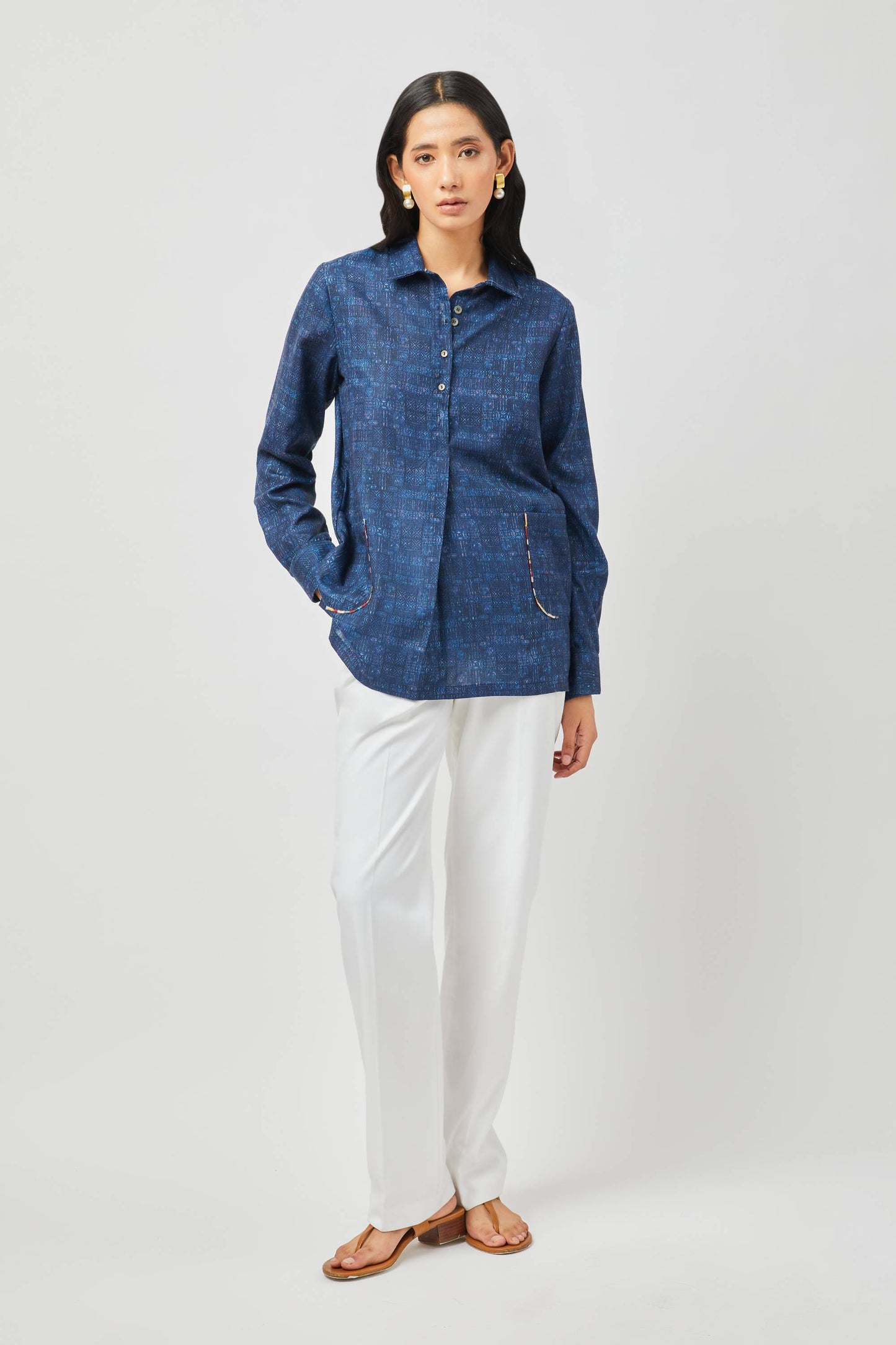 Stylera long sleeve cotton shirt for women in navy blue worn with white pants and sandals