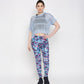 Blue netted top for women paired with vibrant floral leggings for a stylish workout look
