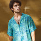 Stylish blue oversize shirt for men with vibrant graphic print, perfect for casual outings