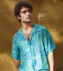 Stylish blue oversize shirt for men with vibrant graphic print, perfect for casual outings