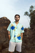 Blue oversized shirt for men with vibrant floral print, perfect for casual summer outings