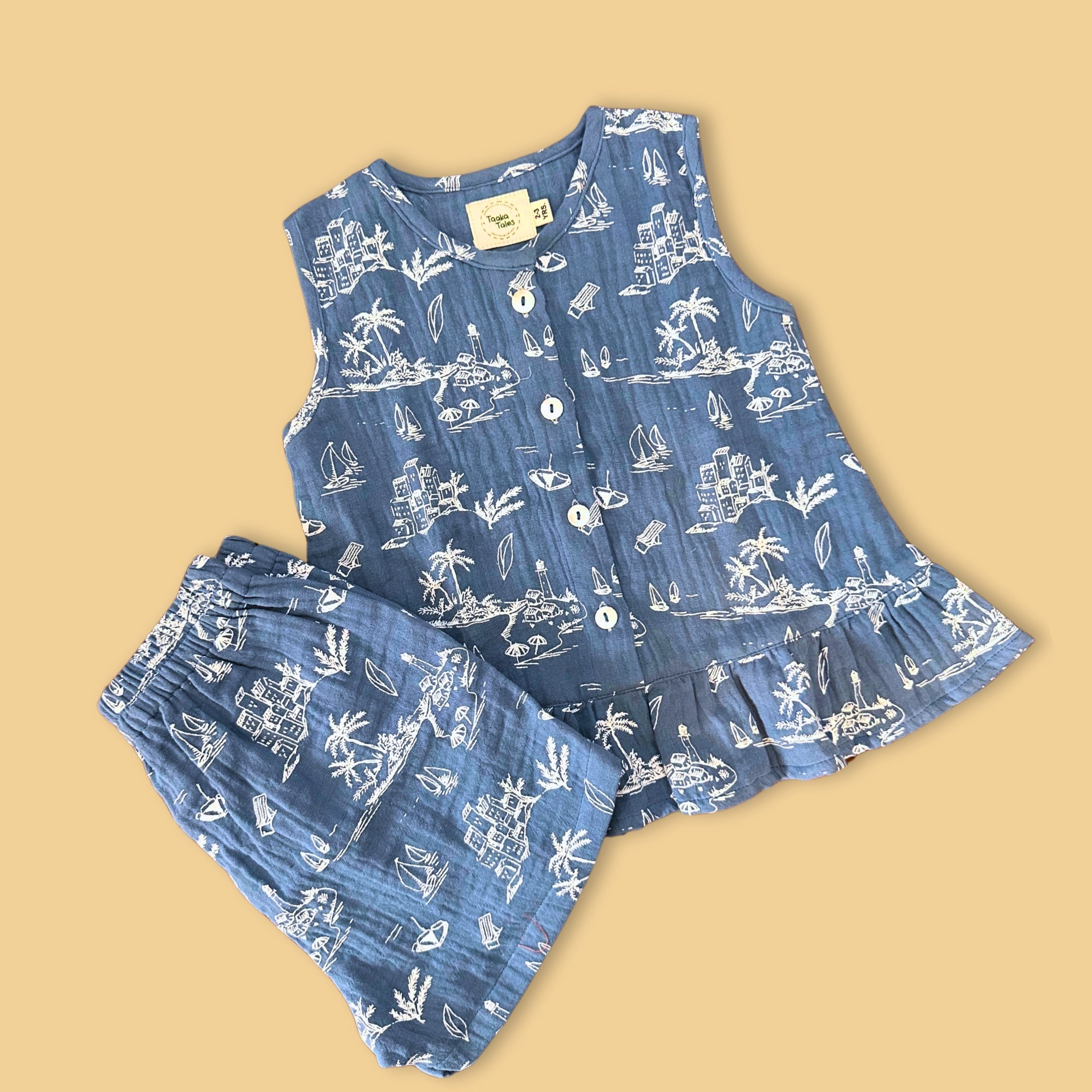 Stylera blue sleeveless top and shorts set with beach-themed print for a stylish summer look
