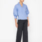 Stylera blue v neck blouse with puff sleeves paired with black wide leg pants