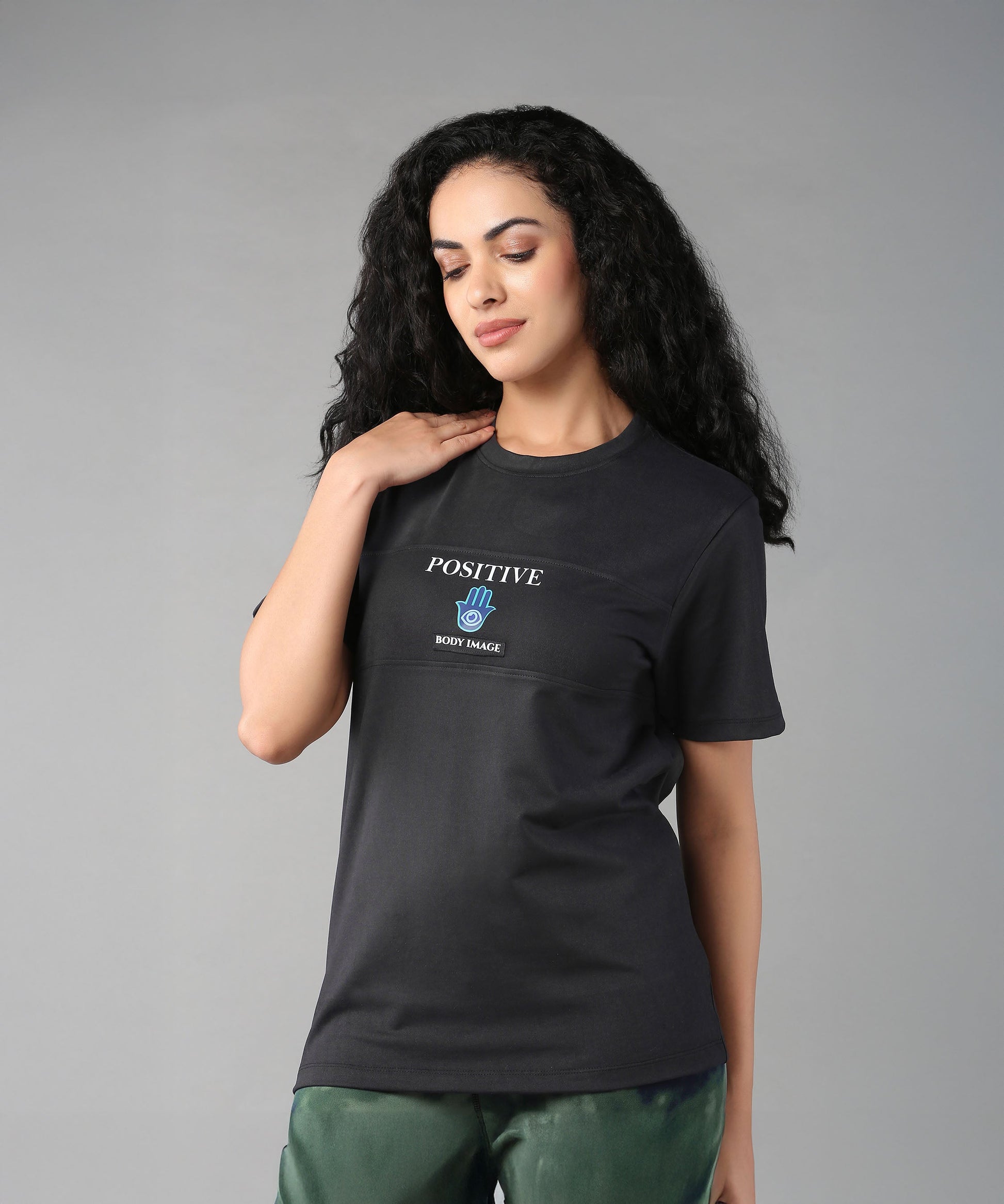 Black T-shirt featuring a positive message, perfect body positivity clothing for women.