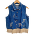 embroidered denim vest for women by Stylera sleeveless button front blue with leaf and tiger embroidery and fringe hem