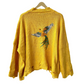 yellow knit sweater for women with embroidered colorful bird on back oversized distressed hem by Stylera