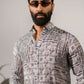 Stylish boho white silk shirt for men with intricate patterns and a relaxed fit