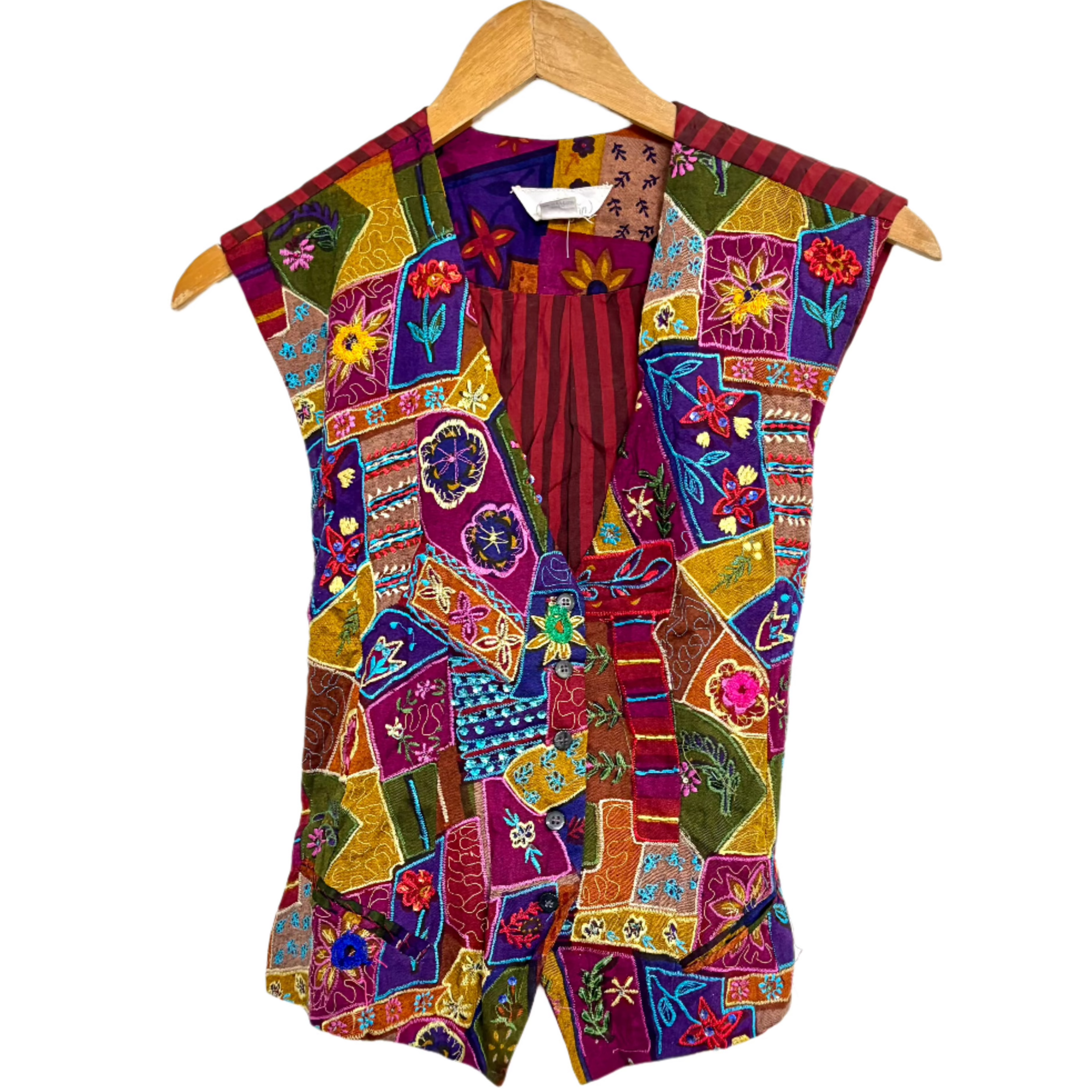 Colorful embroidered patchwork V neck handmade ethnic vest for women on wooden hanger