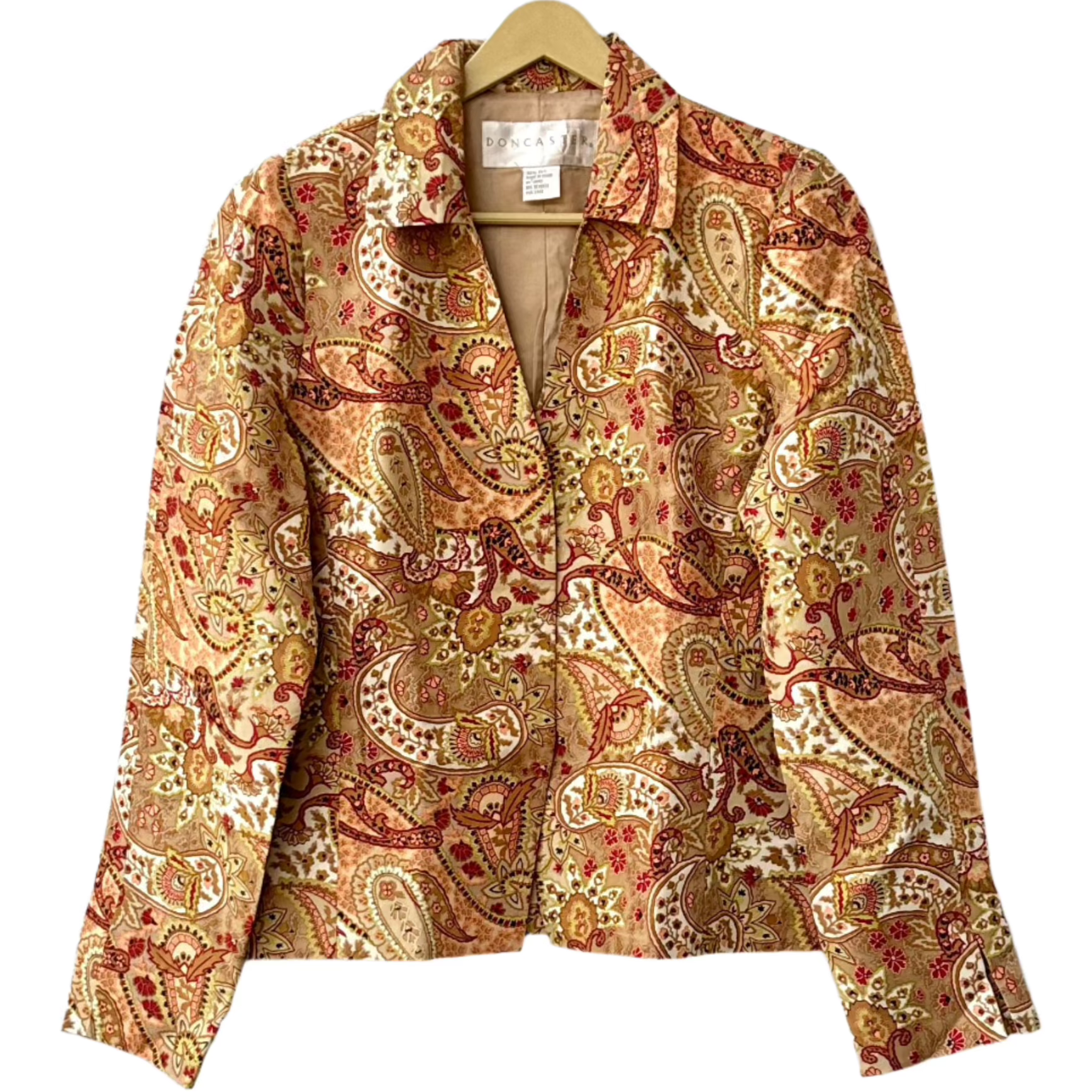 vintage paisley print jacket from Stylera collared long sleeve gold and rust paisley design on hanger