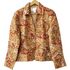 vintage paisley print jacket from Stylera collared long sleeve gold and rust paisley design on hanger