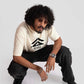 Man wearing Stylera cyberpunk oversized t-shirt in cream with black graphic design and black pants