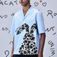 Light blue relax fit shirt for men by Stylera with black and white bunny graphic