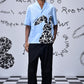 Light blue relax fit shirt for men by Stylera with black and white abstract design