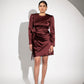 Burgundy satin party dress by Stylera with long sleeves and a stylish wrap design