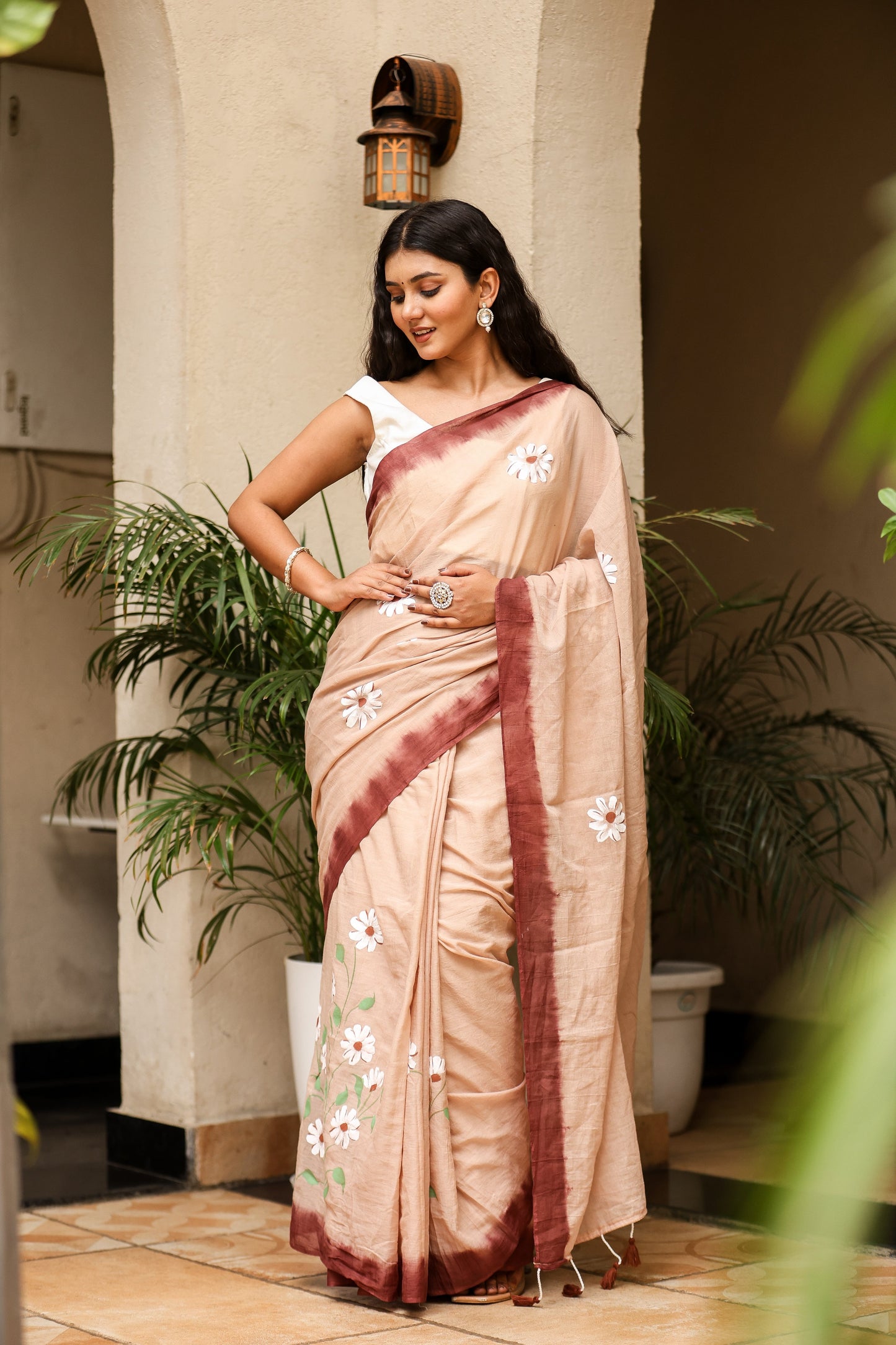 Elegant Stylera malmal saree with designer border, perfect for festive occasions and celebrations.